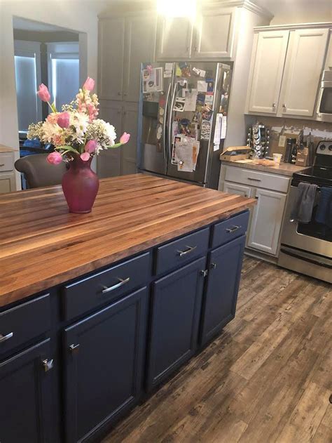 navy blue cabinets with countertops.